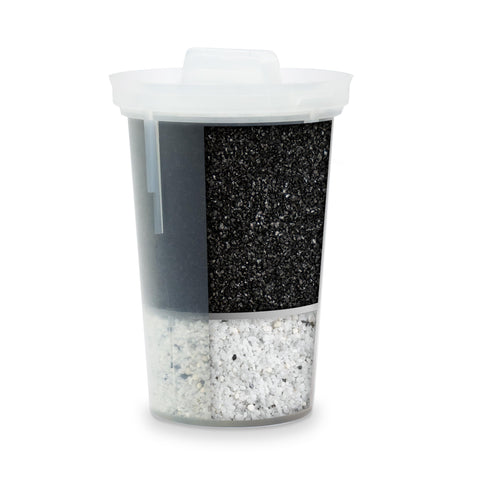 A Santevia MINA filter sits in a pitcher, delivering alkaline water.