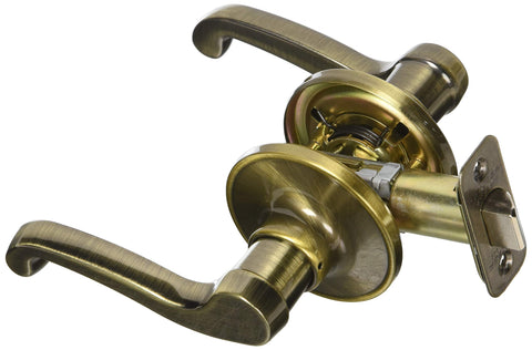 Schlage J Dexter antique brass lever handle closeup highlighting sturdy construction.