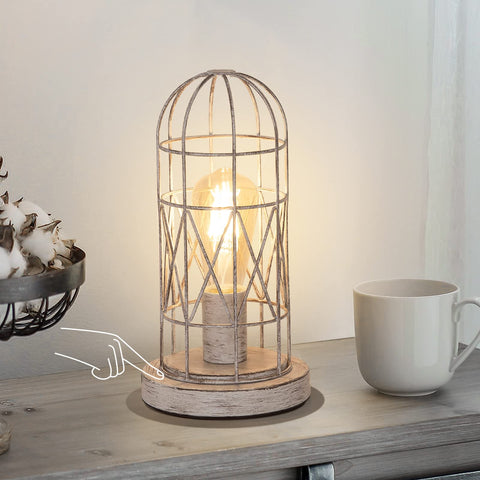 Seaside Village small table lamp with openwork shade adds farmhouse charm to a bedroom.