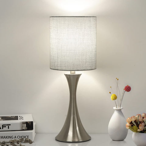Seaside Village three-way touch lamp base offers steady support for bedside reading.