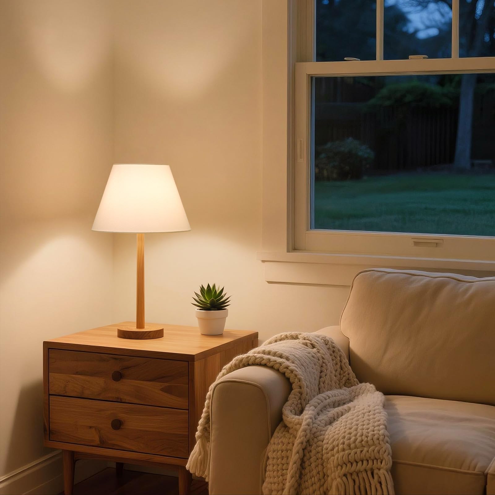 Seaside Village white lamp shade on wall sconce for ambient lighting.