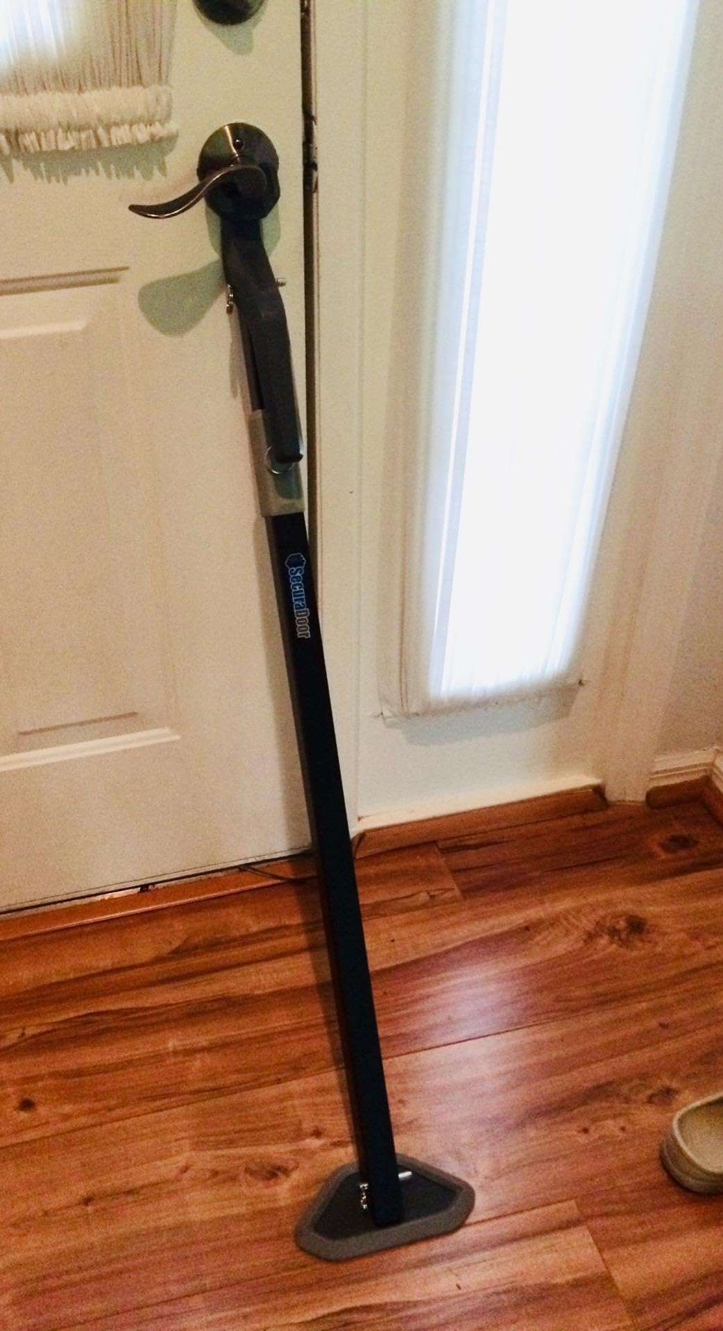 SecuraDoor portable security bar used in dorm rooms