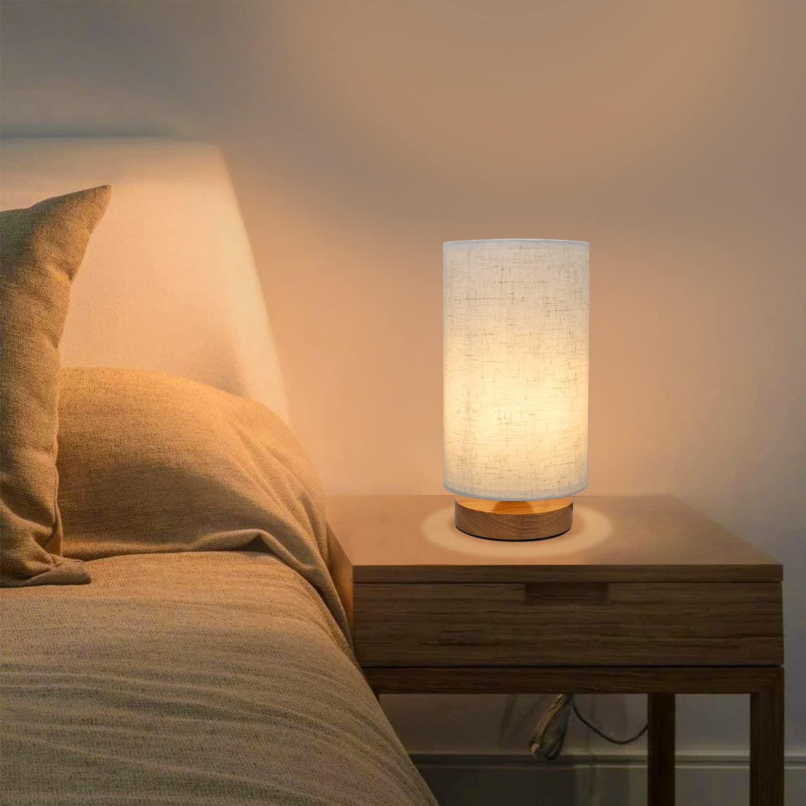 Soft fabric shade diffuses light into a gentle glow