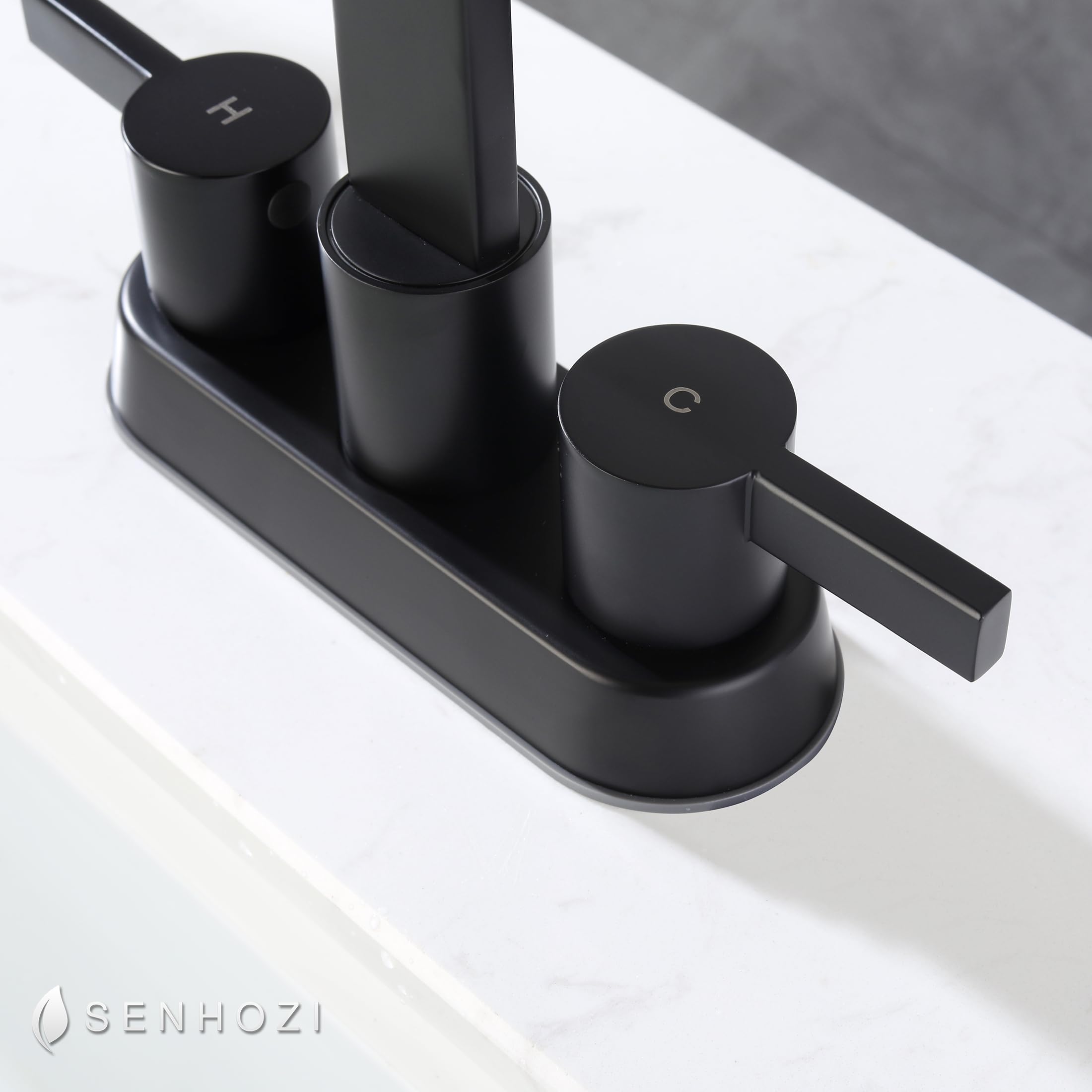 Senhozi SE-0048-BK in a 3-hole design with a graceful waterfall flow.