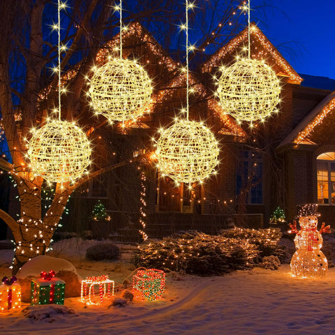 SenLuKit outdoor Christmas balls 4-pack illuminate the yard with a warm, inviting glow.