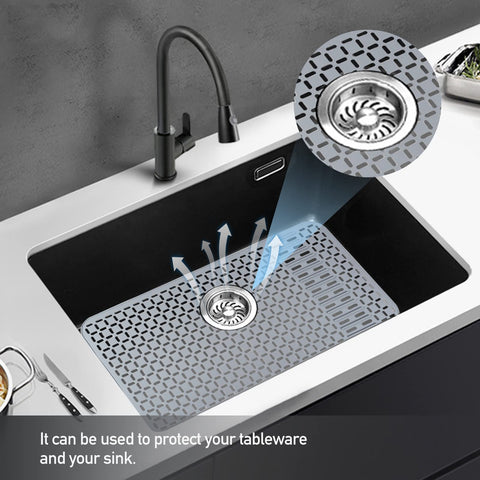 Sentoda silicone sink mat doubles as a dishware drainer within the sink setup.