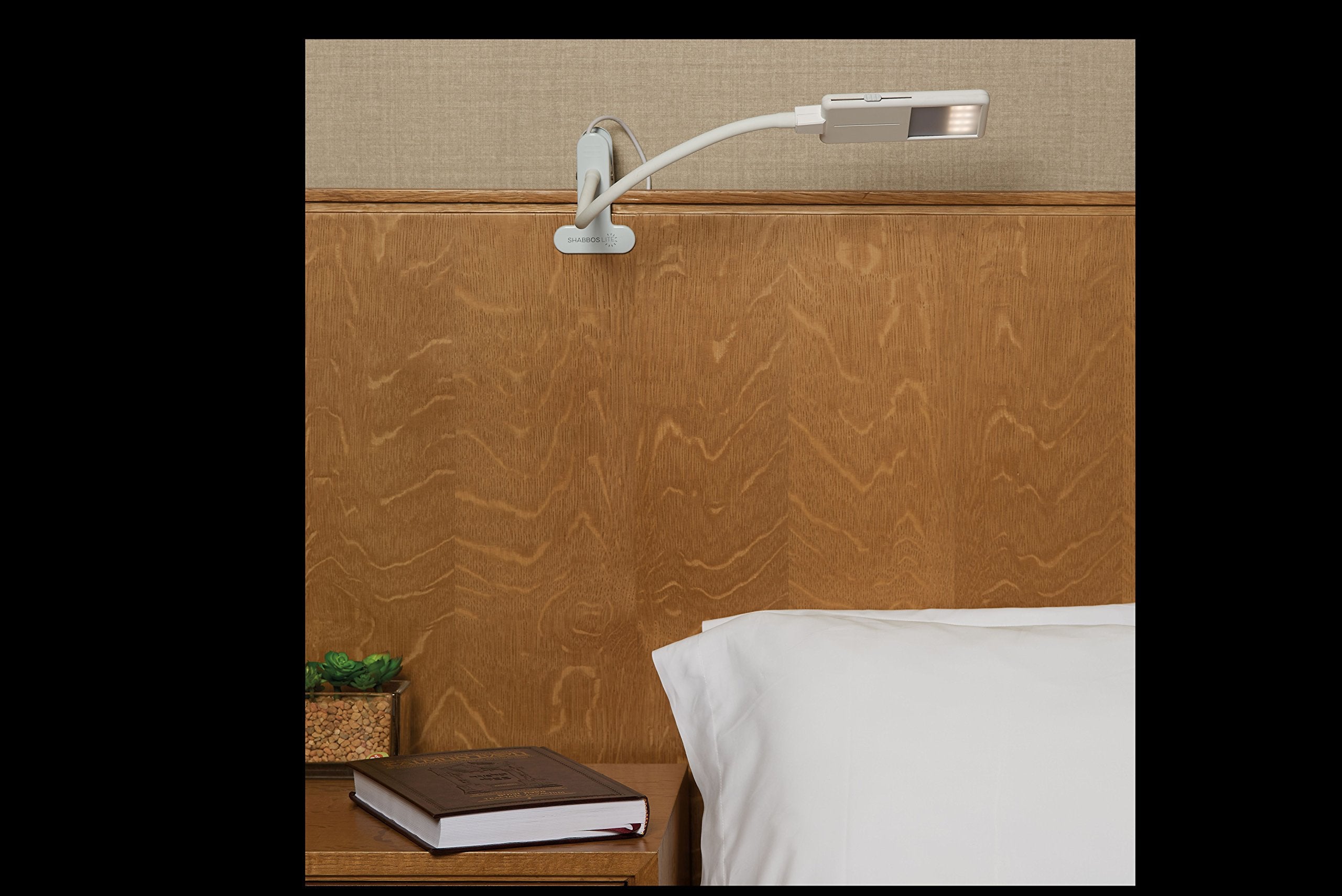 SHABBOSLITE gooseneck adjusts light direction for precise reading