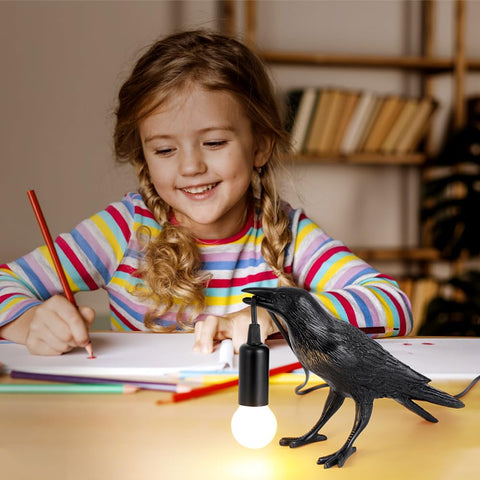 Shandaglo crow lamp at bedside for warm ambient lighting