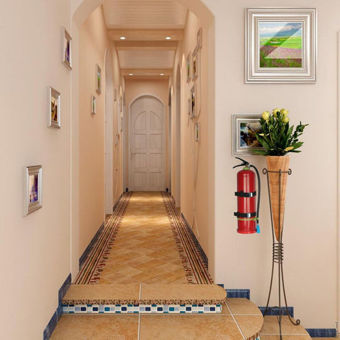 Shankala nylon strap secures the extinguisher for quick access.