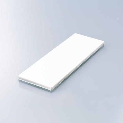 Shapton GlassStone 6000 on wooden stand indicates stable sharpening setup