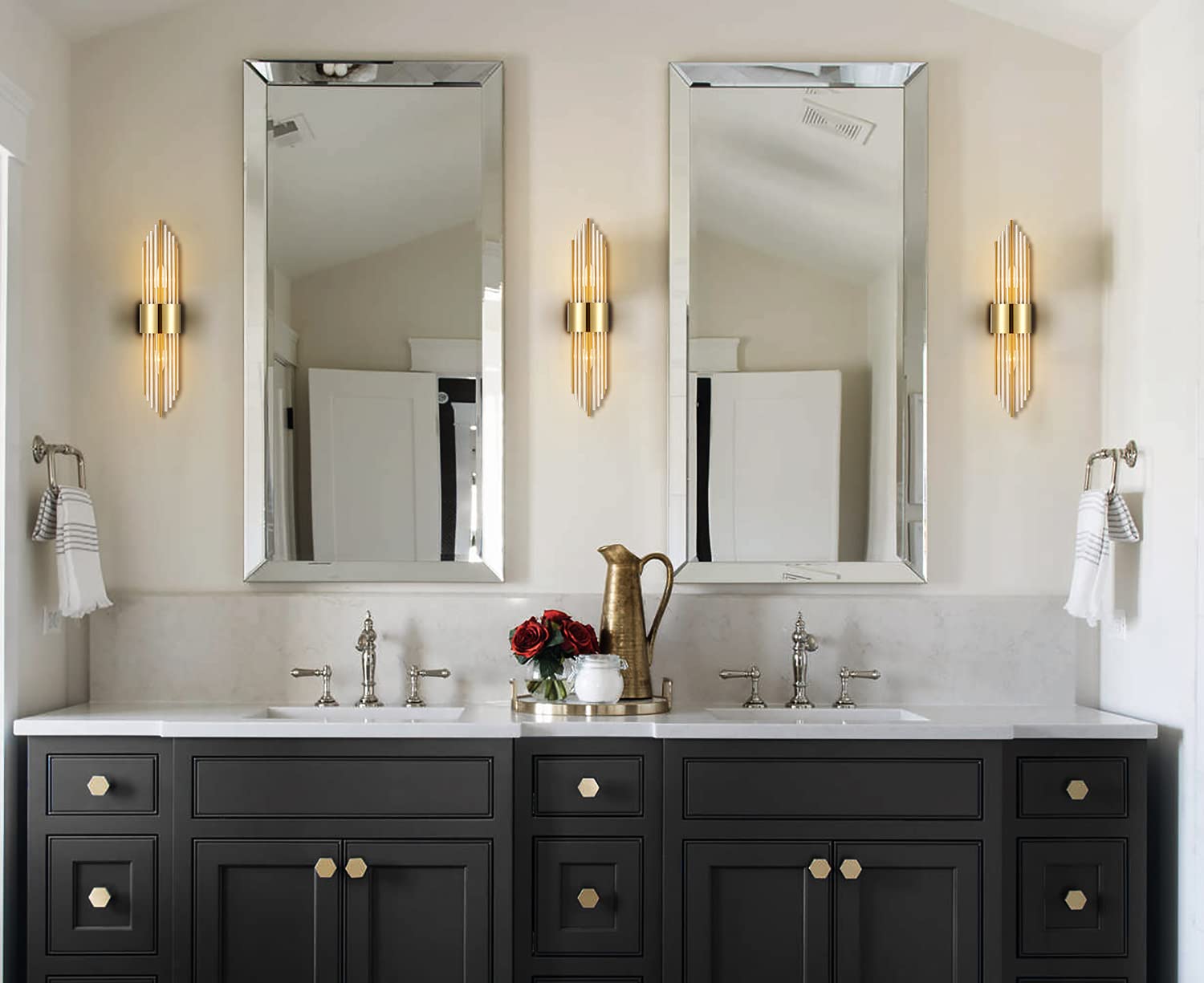 Shawnkey bedroom ambiance created by warm brushed-titanium gold fixtures