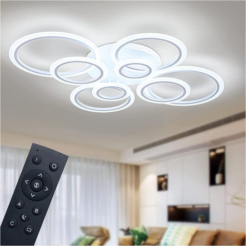 Shine LUEST eight-ring LED ceiling light in matte white elevates living room ambience.