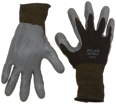 SHOWA Atlas 370 black work gloves on hand with a strong grip for tough tasks.