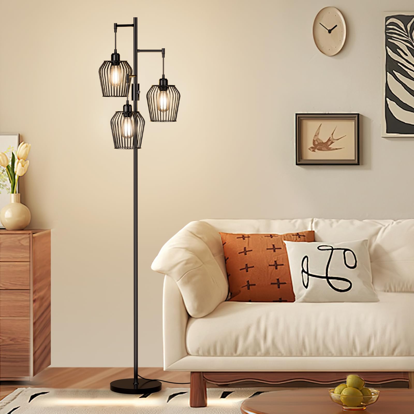 SIBRILLE dimmable floor lamp with three cage shades enhances living room ambience.