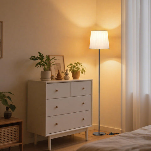 SIBRILLE floor lamp beside the bed for relaxing evenings