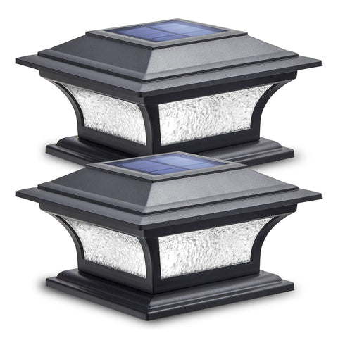 SIEDiNLAR solar post light with warm white glass frame creates inviting dusk ambiance on fences.