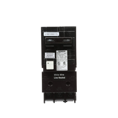 Close-up of the self-test indicator on Siemens QF230AP performing an automatic safety check.