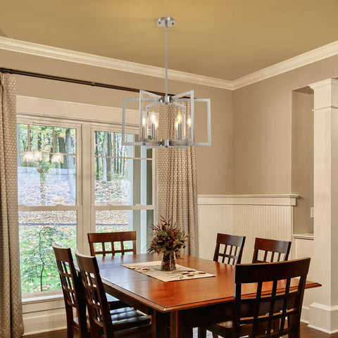 Sigaitwei brushed nickel chandelier over a kitchen island enhances task lighting and style.