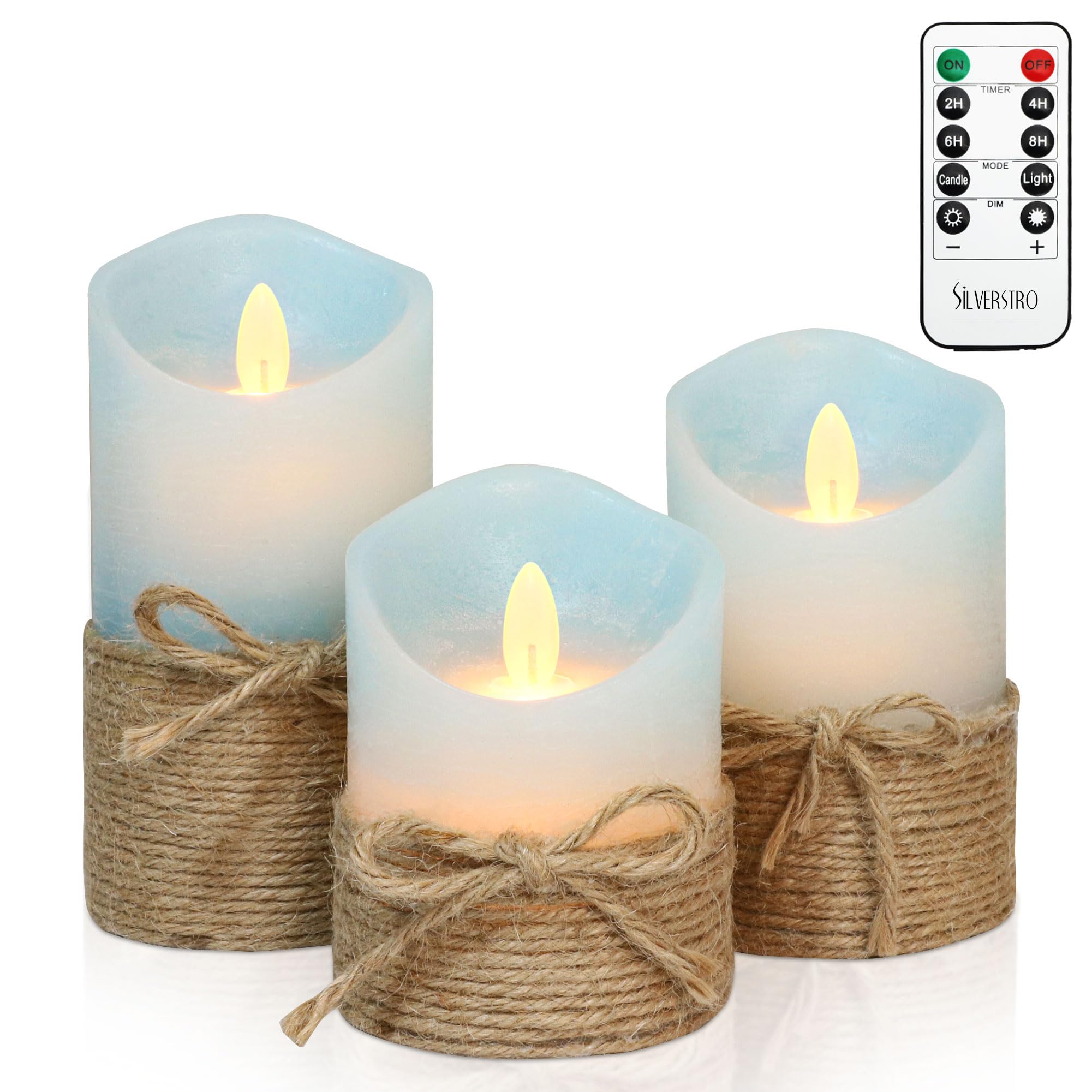 Silverstro nautical candles on table emit warm, ocean-inspired glow for cozy ambiance.