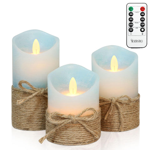 Silverstro nautical candles on table emit warm, ocean-inspired glow for cozy ambiance.