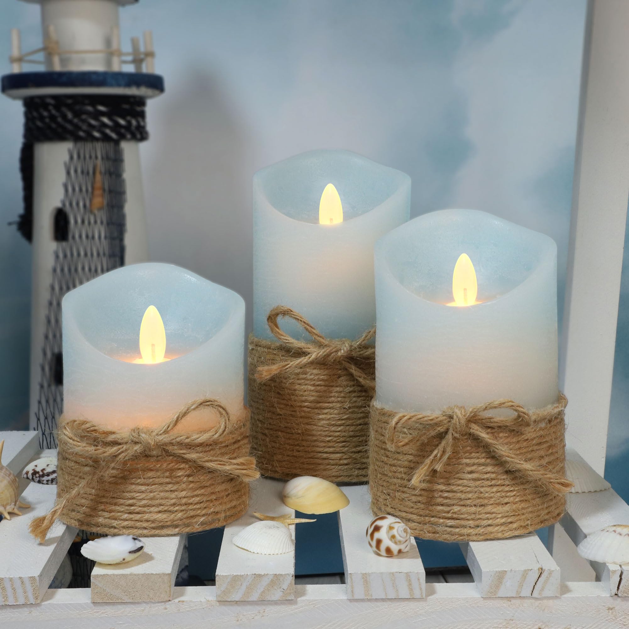 Silverstro ocean blue flameless candle glows softly, powered by 2 AA batteries.