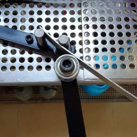 Singring device with long 340mm handle for controlled bending.