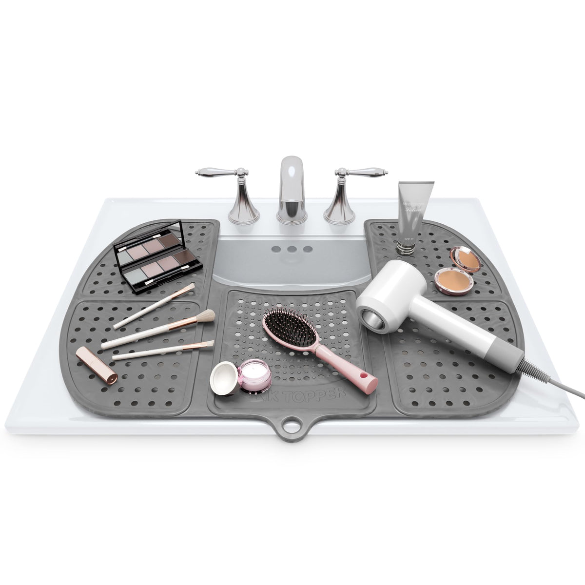 Sink Topper foldable silicone mat over sink adds space and protection.