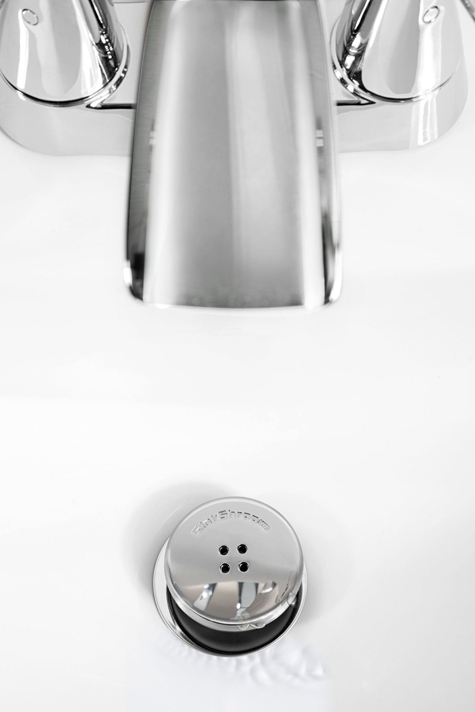 Close-up of SinkShroom chrome edge showing easy wipe-clean surface.