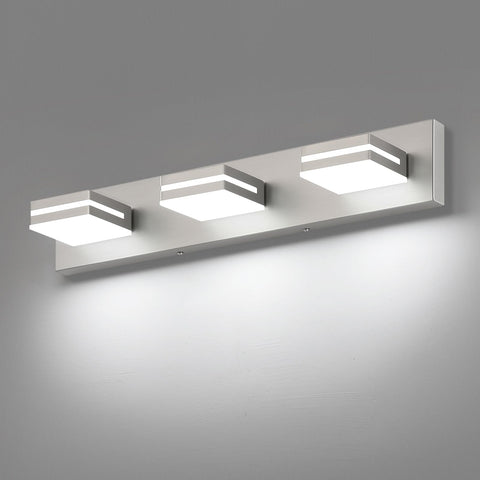 SineRise 3-light vanity fixture in brushed nickel over mirror for even makeup lighting.