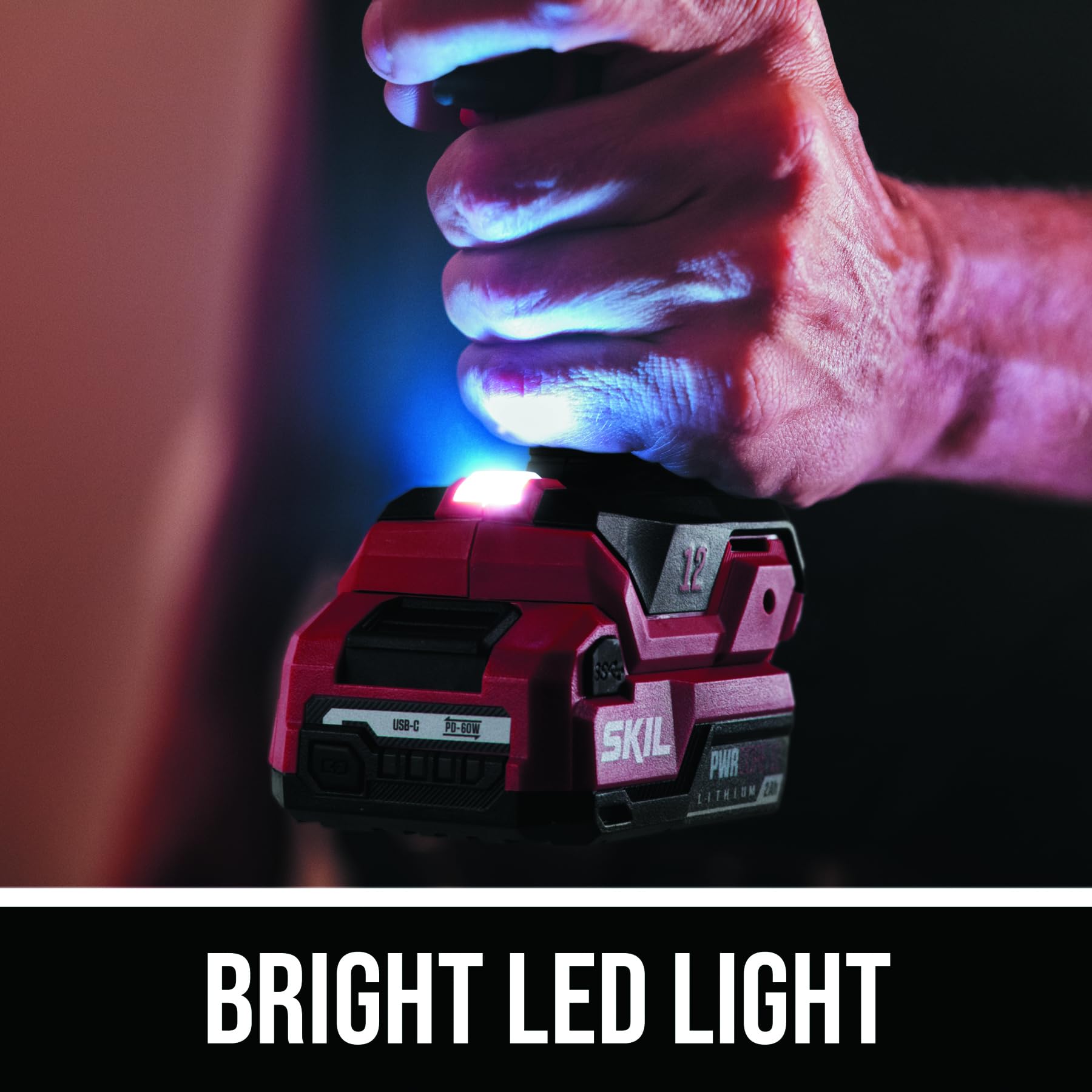 LED work light on Skil drill for improved visibility in dim tasks.