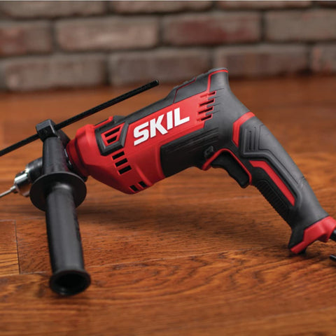 Skil hammer drill with side-assist handle for precise control during work.