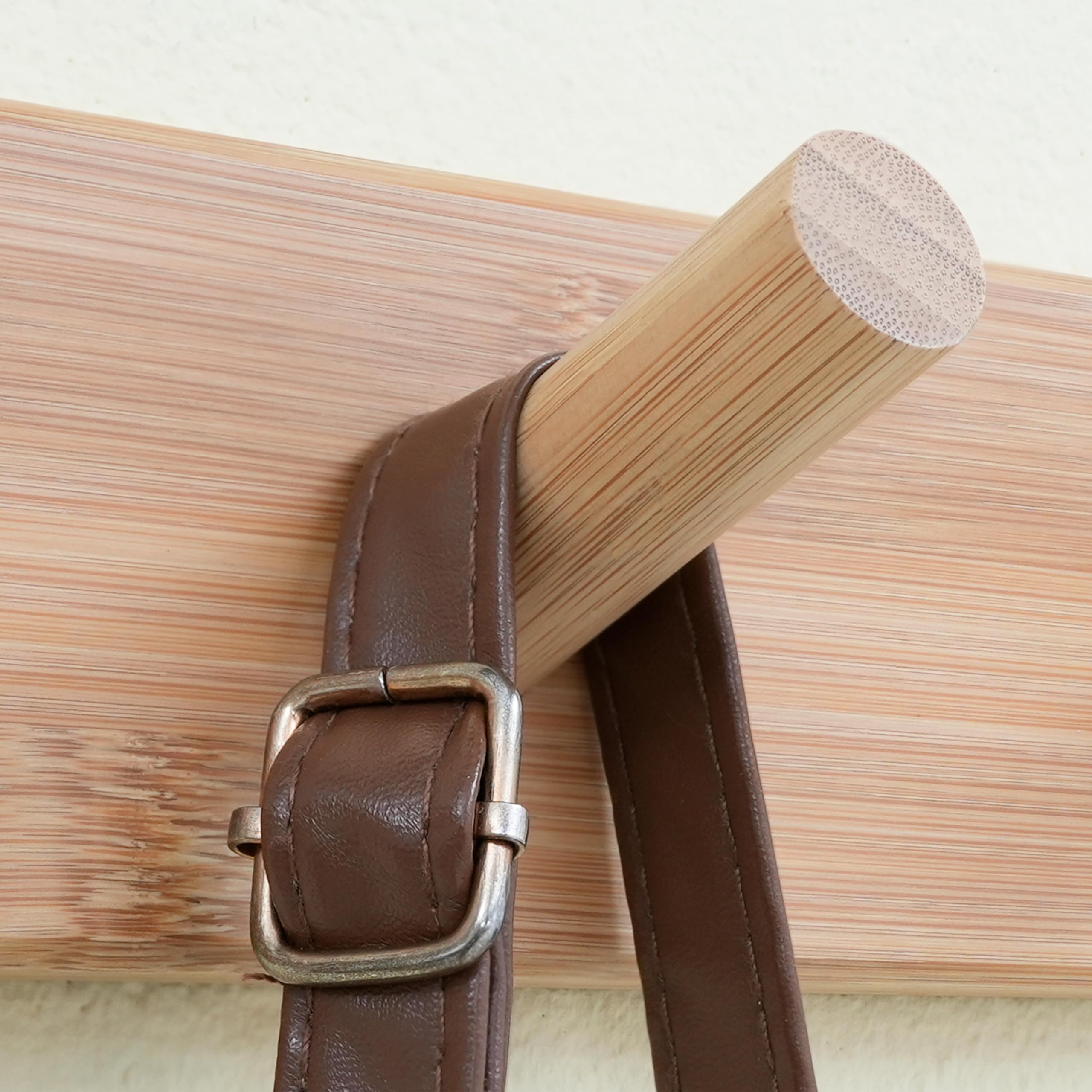 Natural gold finish on bamboo rack complements rustic and modern decor
