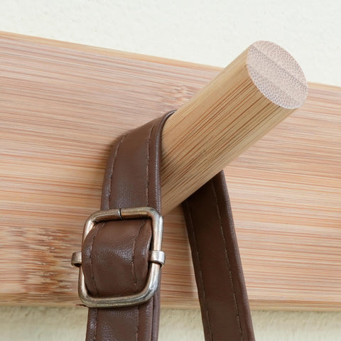 Natural gold finish on bamboo rack complements rustic and modern decor