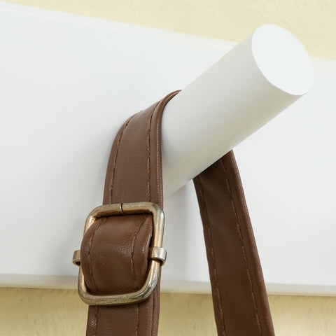 SKOLOO space-saving wall rack helps organize jackets and bags efficiently.