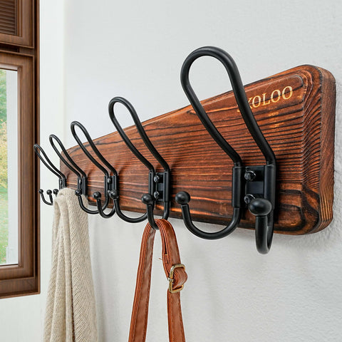 Close-up of durable iron detail on SKOLOO coat rack showing solid construction.