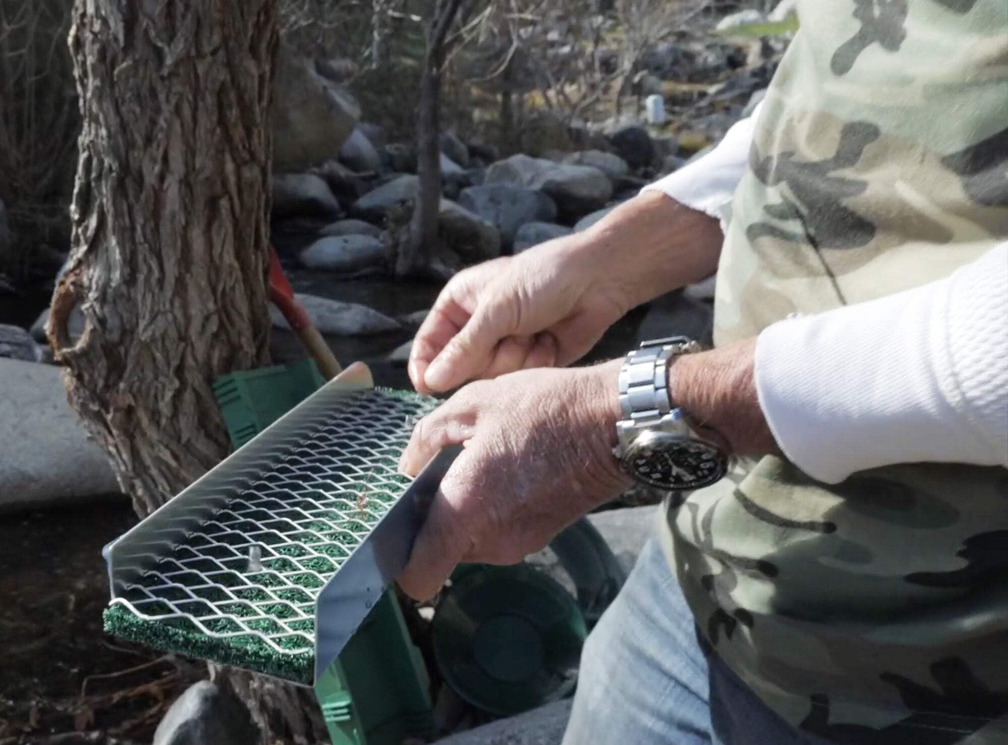 Sluice Fox Pocket Sluice Box in river use demonstrates field-ready setup.