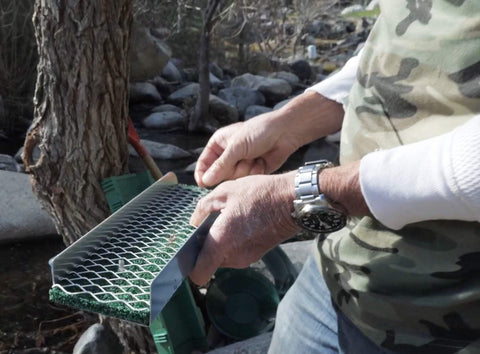 Sluice Fox Pocket Sluice Box in river use demonstrates field-ready setup.