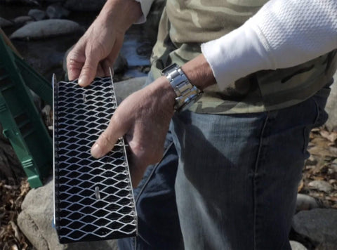 Sluice Fox Pocket Sluice Box pack-ready in a daypack for sampling.