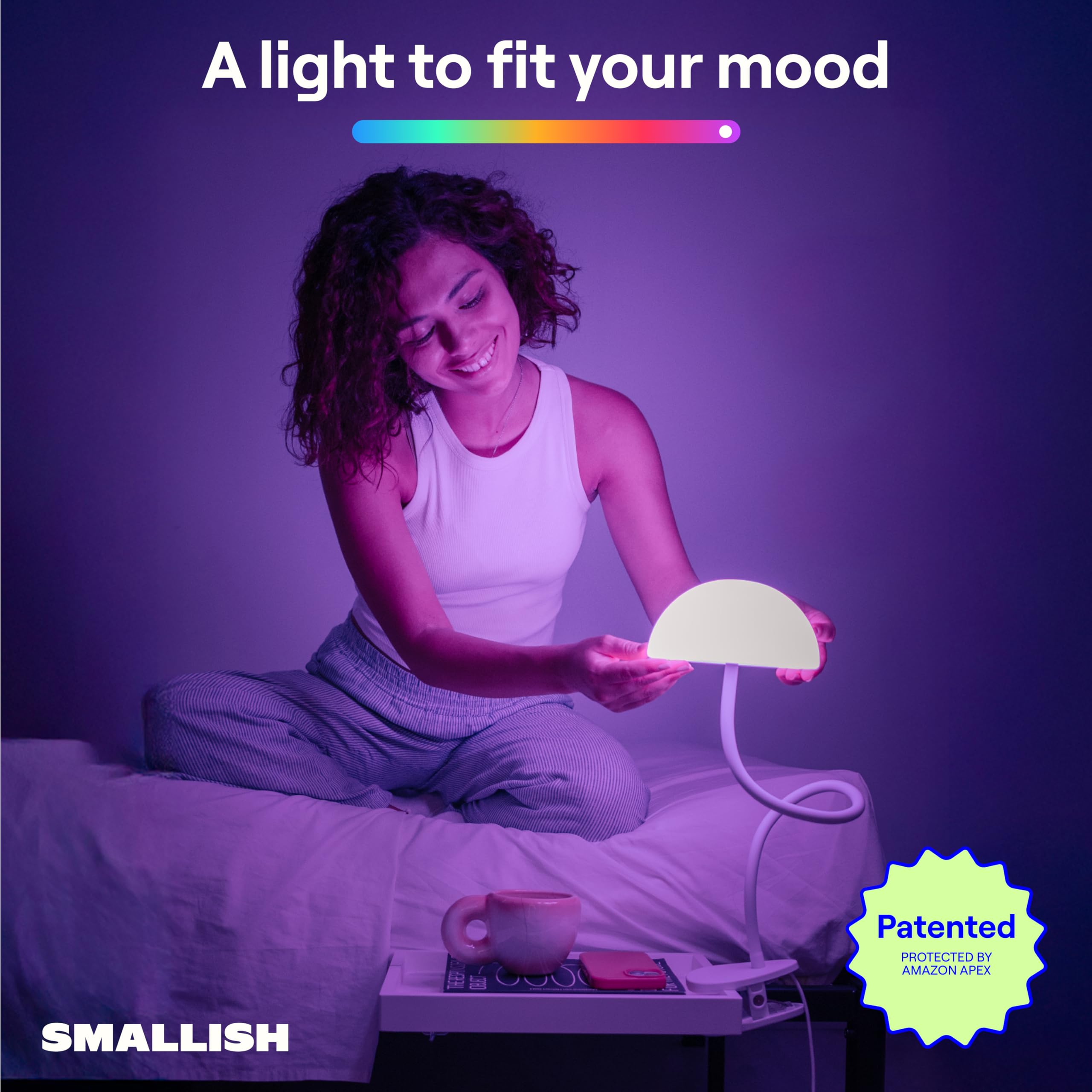 Smallish Shroommate 360-degree arm enables versatile task lighting at desk or bed.