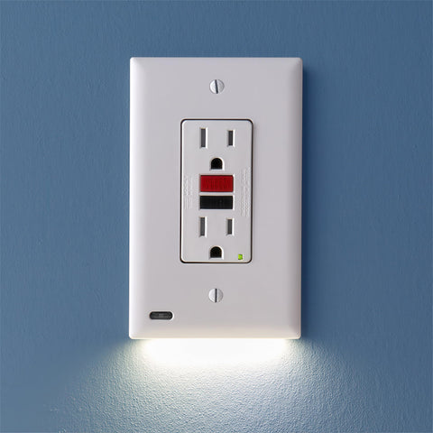SnapPower GuideLight mounted on a GFCI outlet providing flush, safe lighting at night.