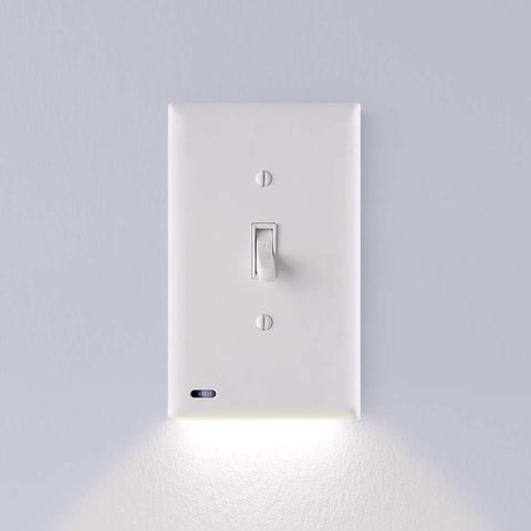 SnapPower SwitchLight wall-faceplate close-up shows a sleek night-light for safer nighttime navigation.