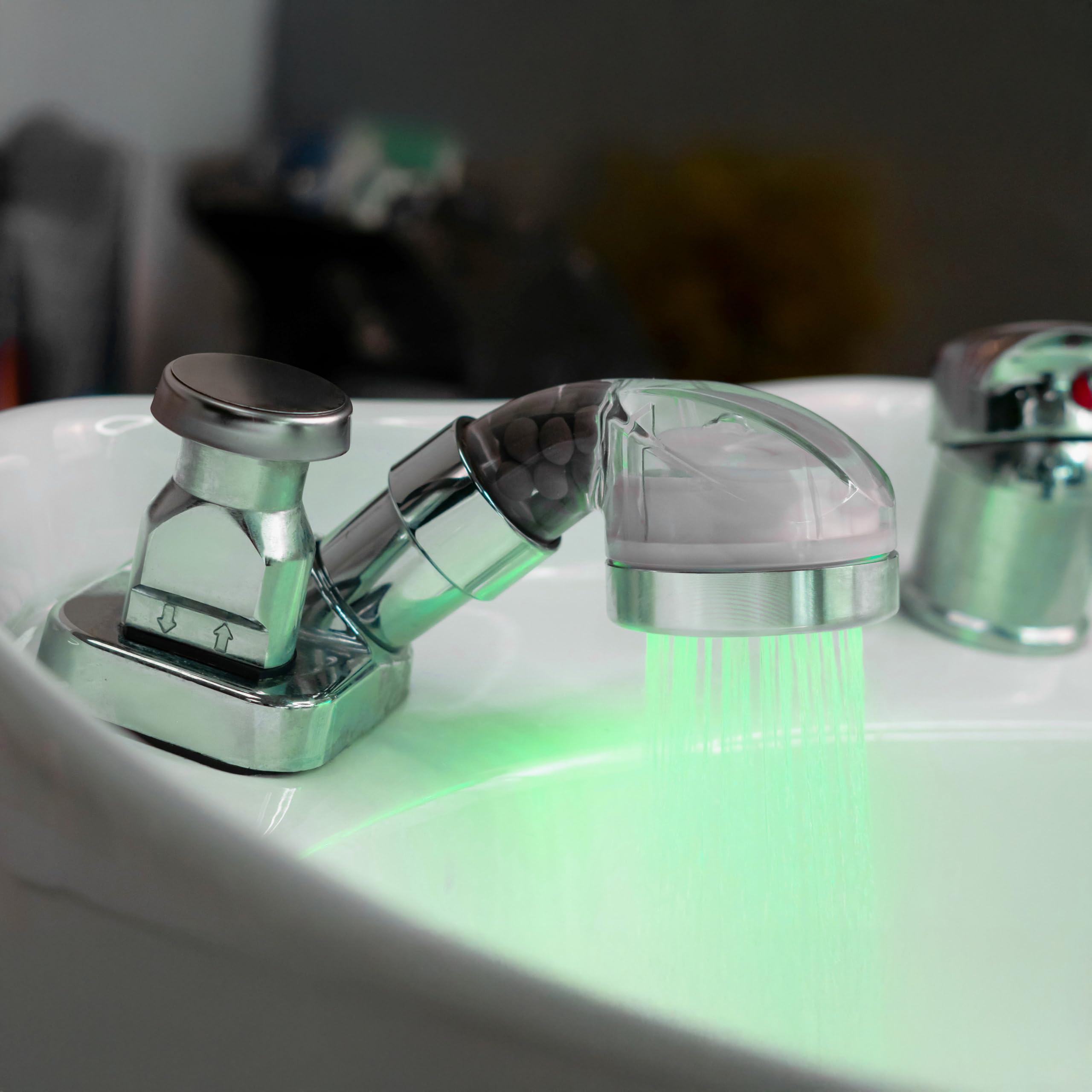 Socila sprayer head water filtration close-up emphasizes cleaner water flow.