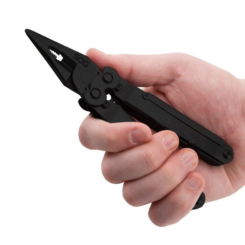 SOG PowerLock sheath attached to MOLLE system for rapid access