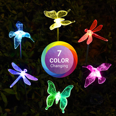 SOLPEX butterfly lights along a yard path provide safe decorative illumination at night.