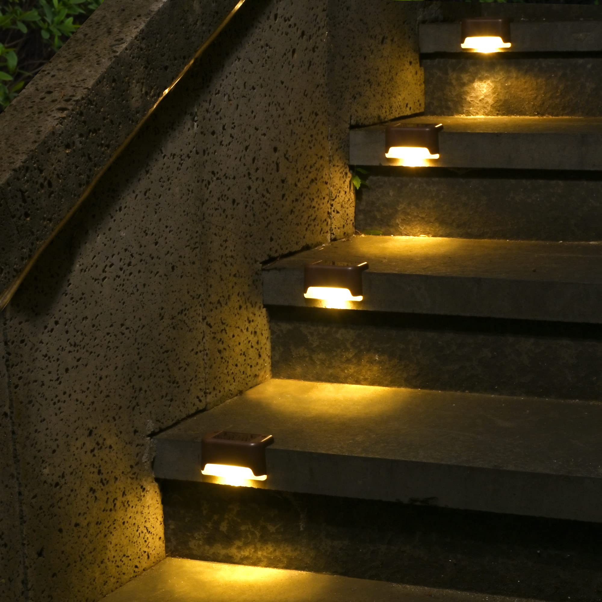 SOLPEX solar deck lights on stairs emitting warm white glow for safer steps.
