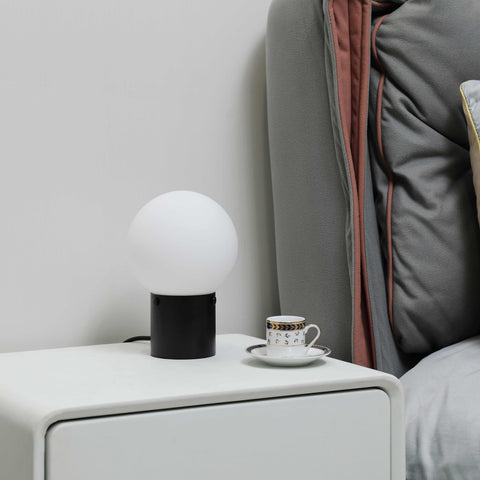 Somniferous bedside lamp supports dimmable options for customizable mood.