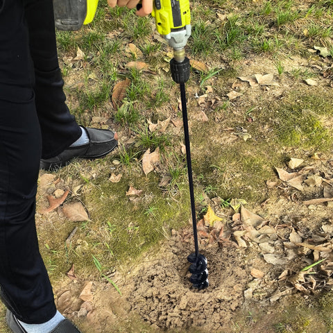 SORANGEUN bulb-planting auger in action in a garden bed