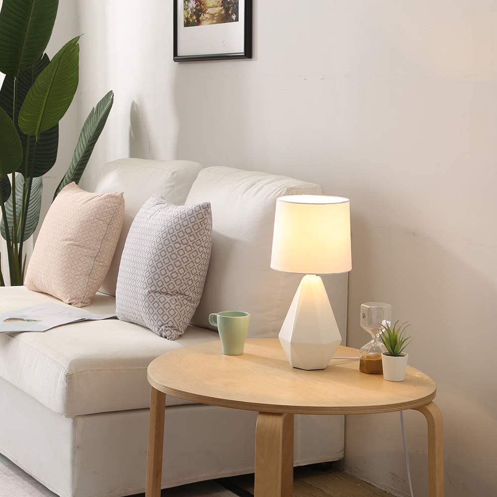 SOTTAE bedside lamp in a bedroom setup with compact footprint