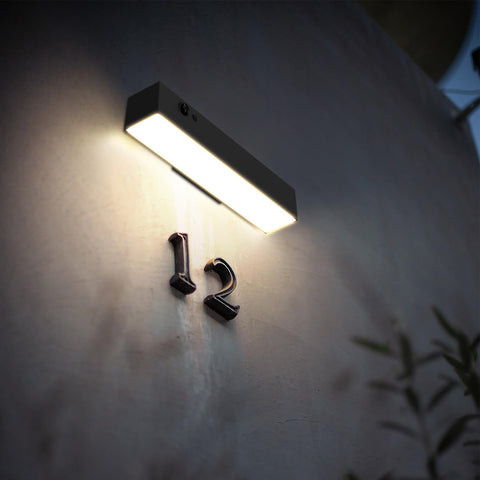 SOTTLOT solar outdoor light front door illuminates entry with a welcoming glow.