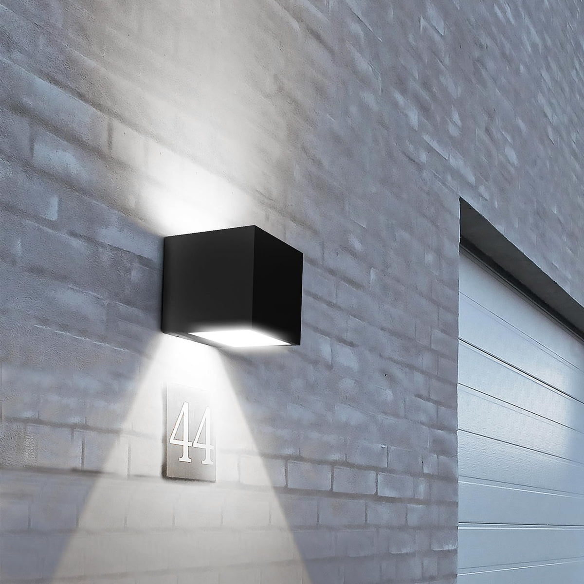 SOTTLOT solar wall light with up and down beams brightens porches